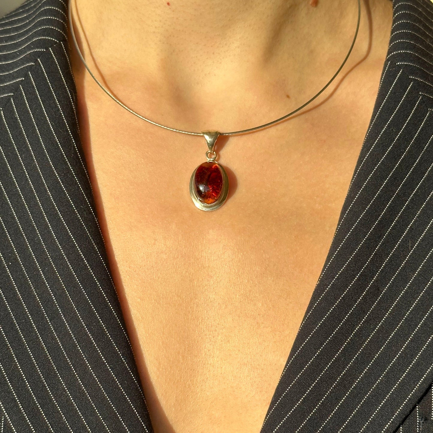 Timeless oval amber pendant