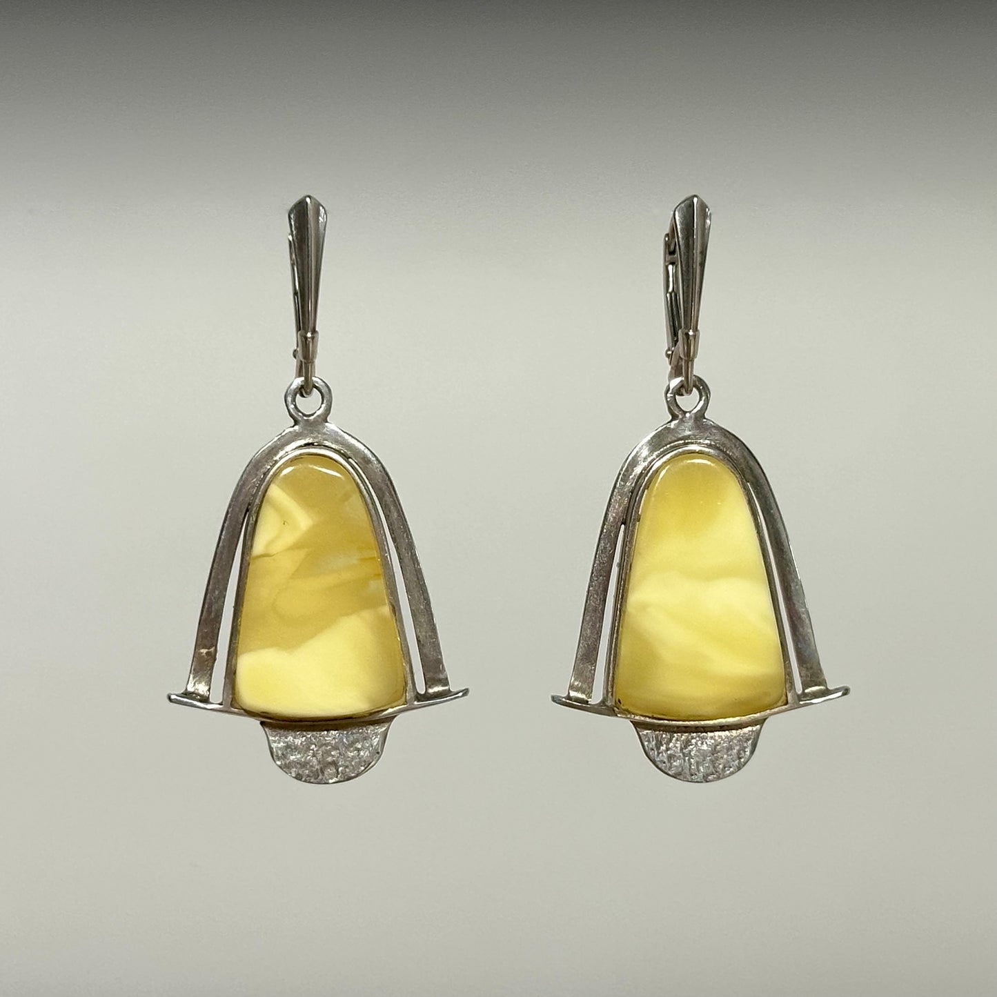 Serene tempest yellow and white amber earrings