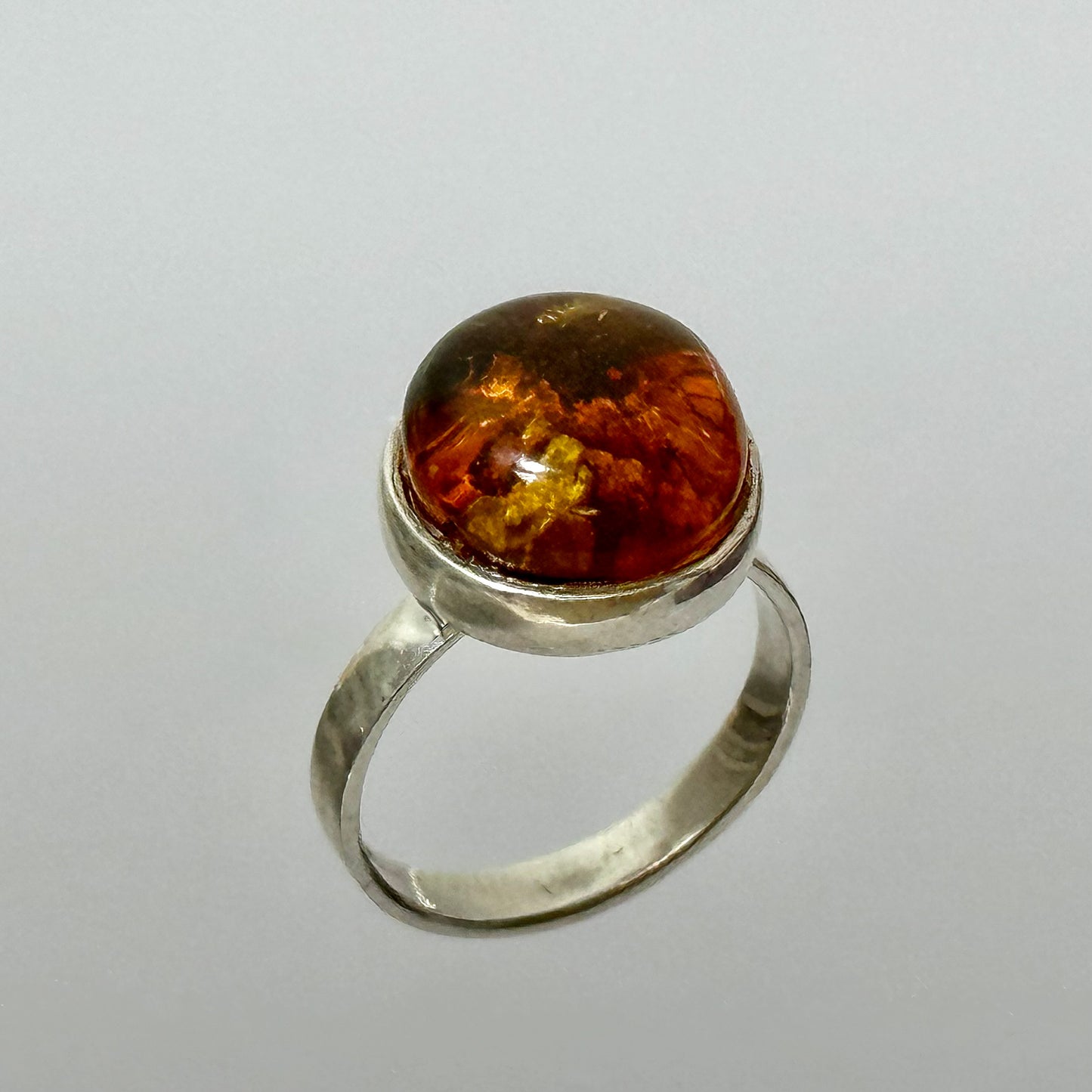 Cognac amber ring with unique inlay
