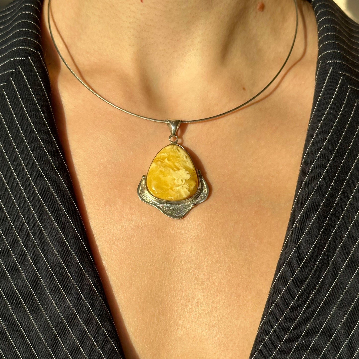 Stunning white amber pendant