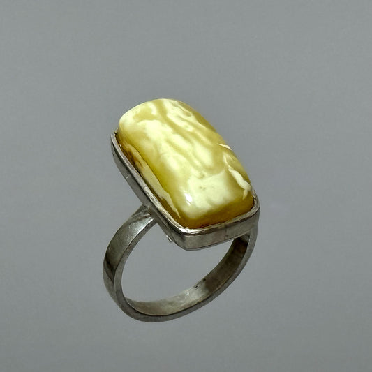White marble-like amber ring