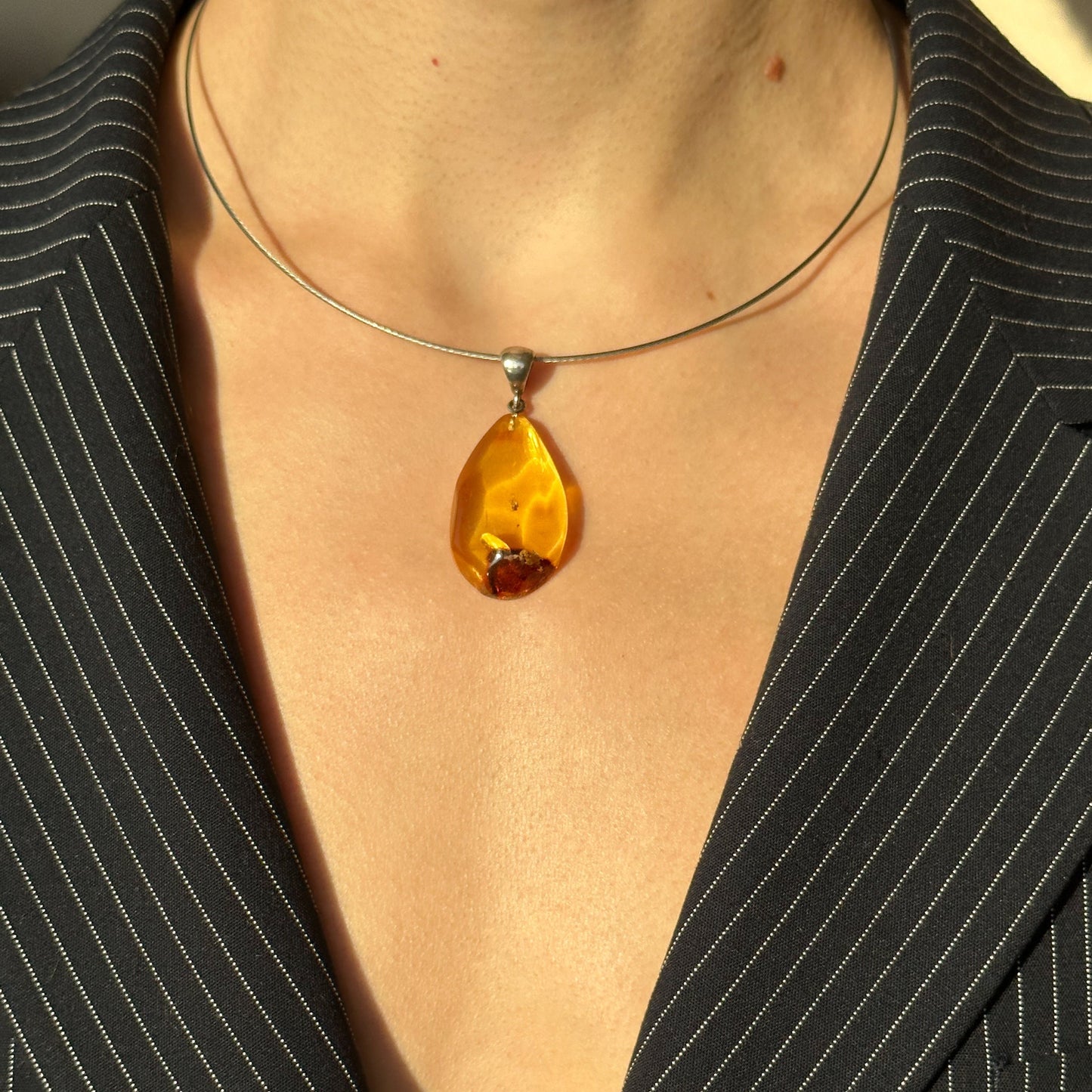 Radiant drop amber pendant