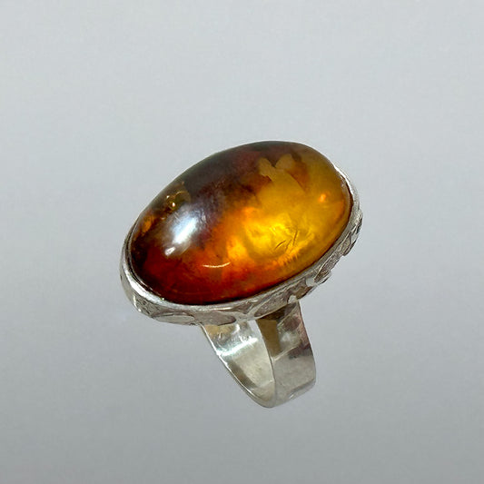 Baltic amber ring in cognac