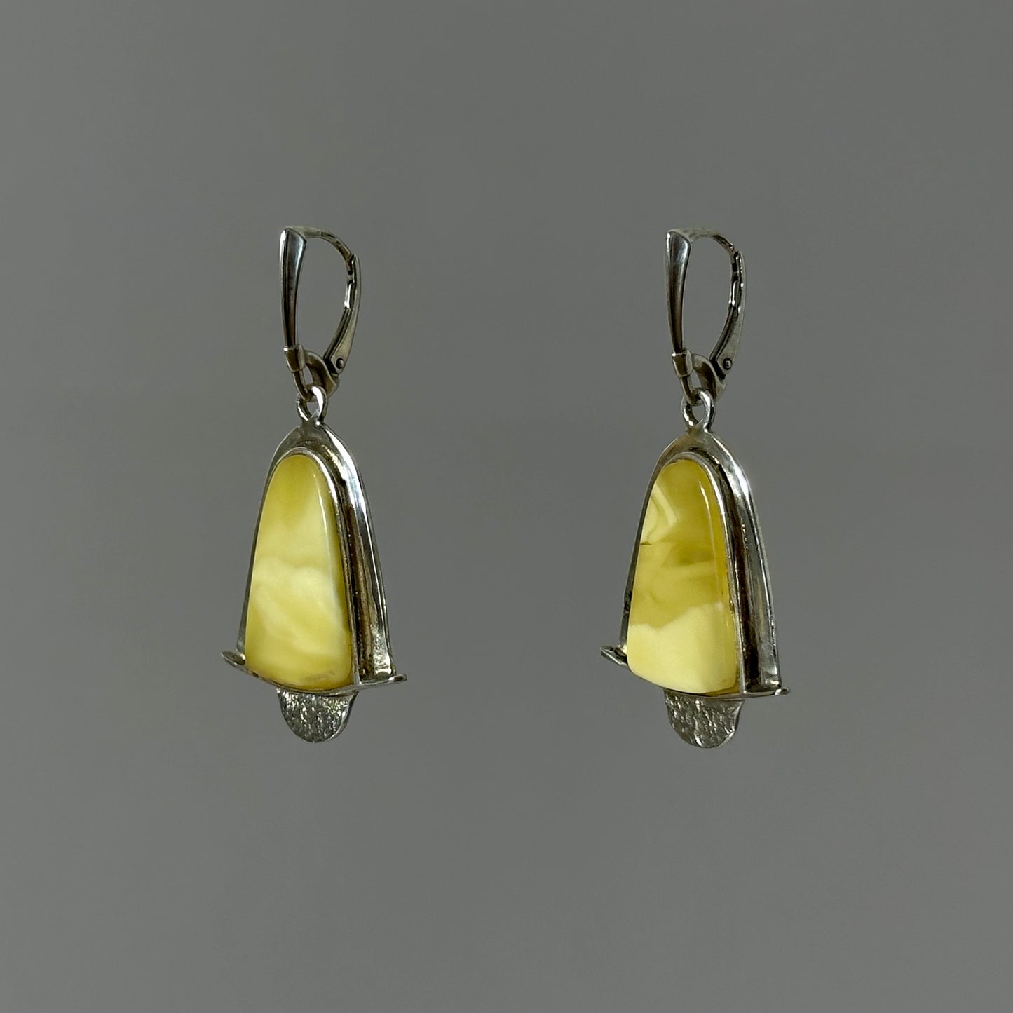 Serene tempest yellow and white amber earrings