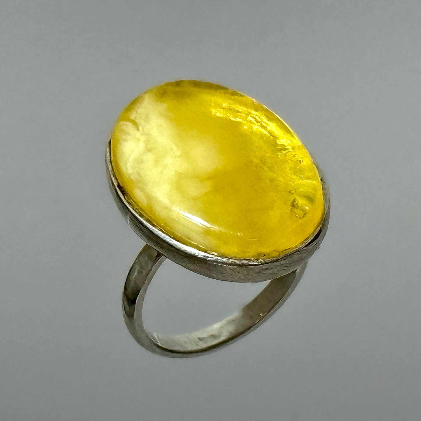 Classic oval white amber ring