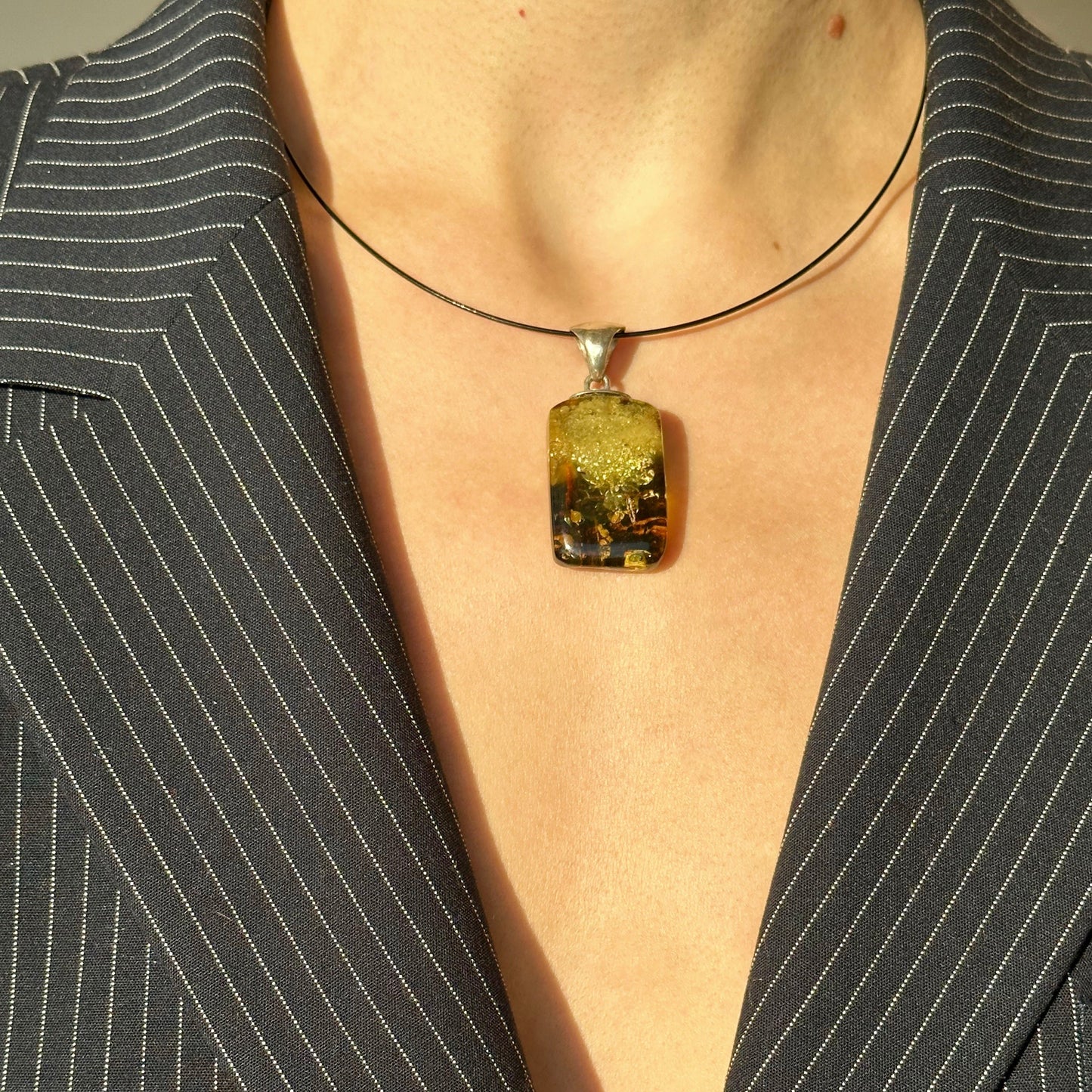 Sea-inspired green amber pendant