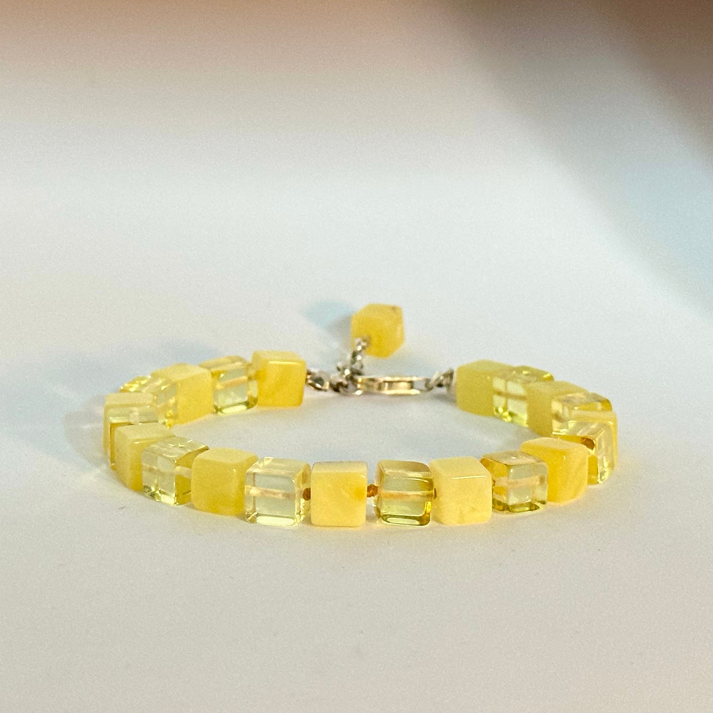 Playful square amber bracelet