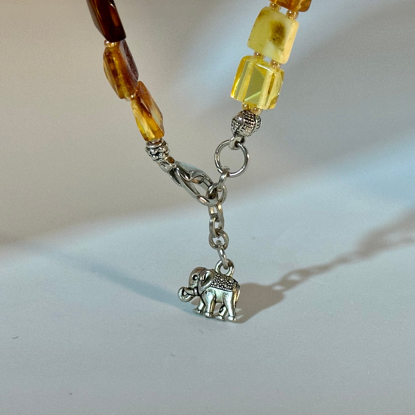 Yellow amber elephant tennis bracelet