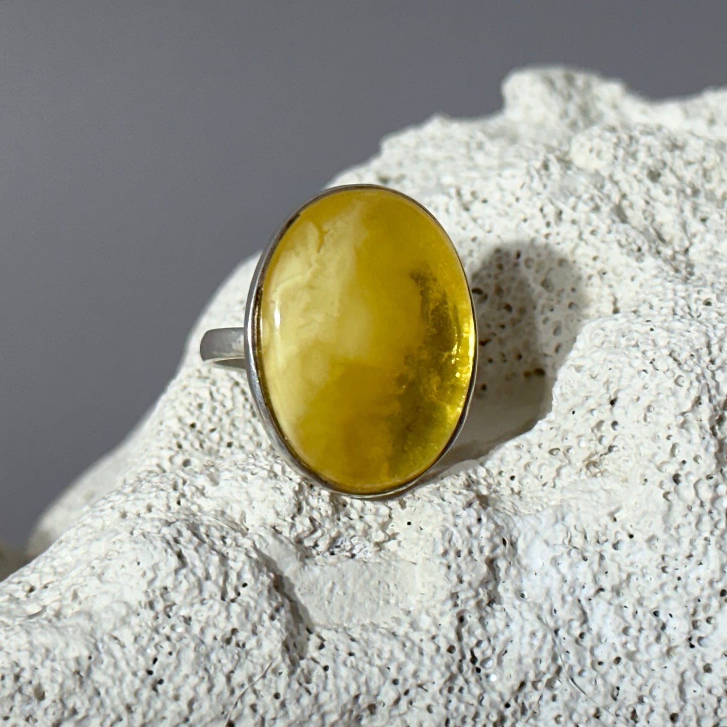 Classic oval white amber ring