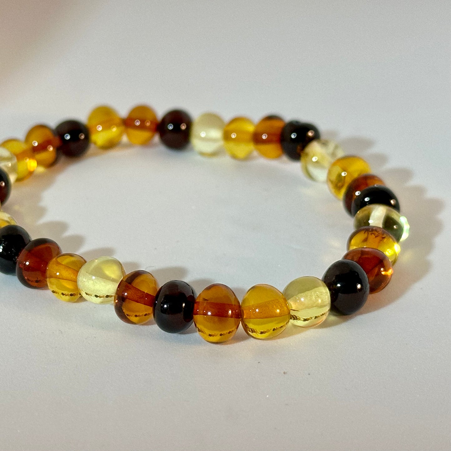 Polished multicolor amber bead bracelet