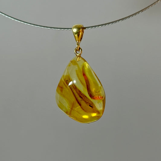 Sunlit clear amber pendant