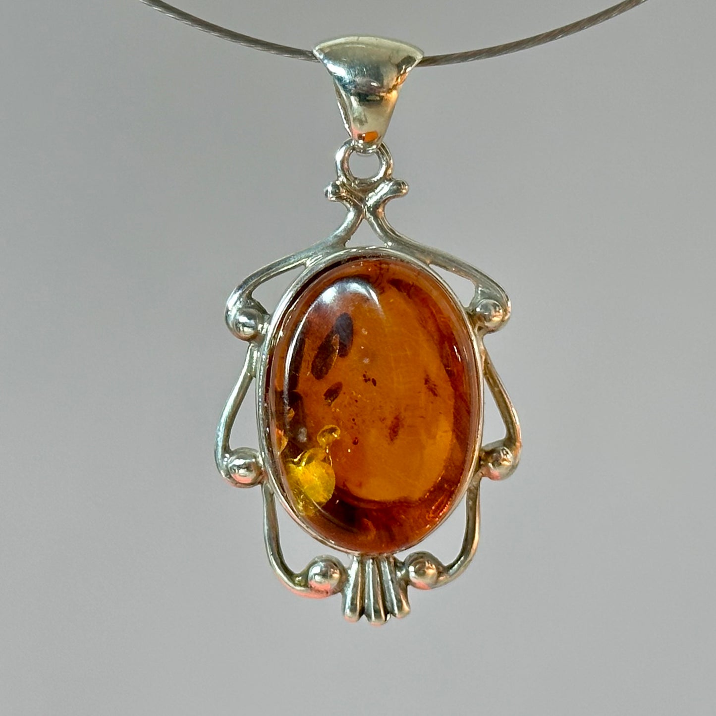 Regal amber silver pendant