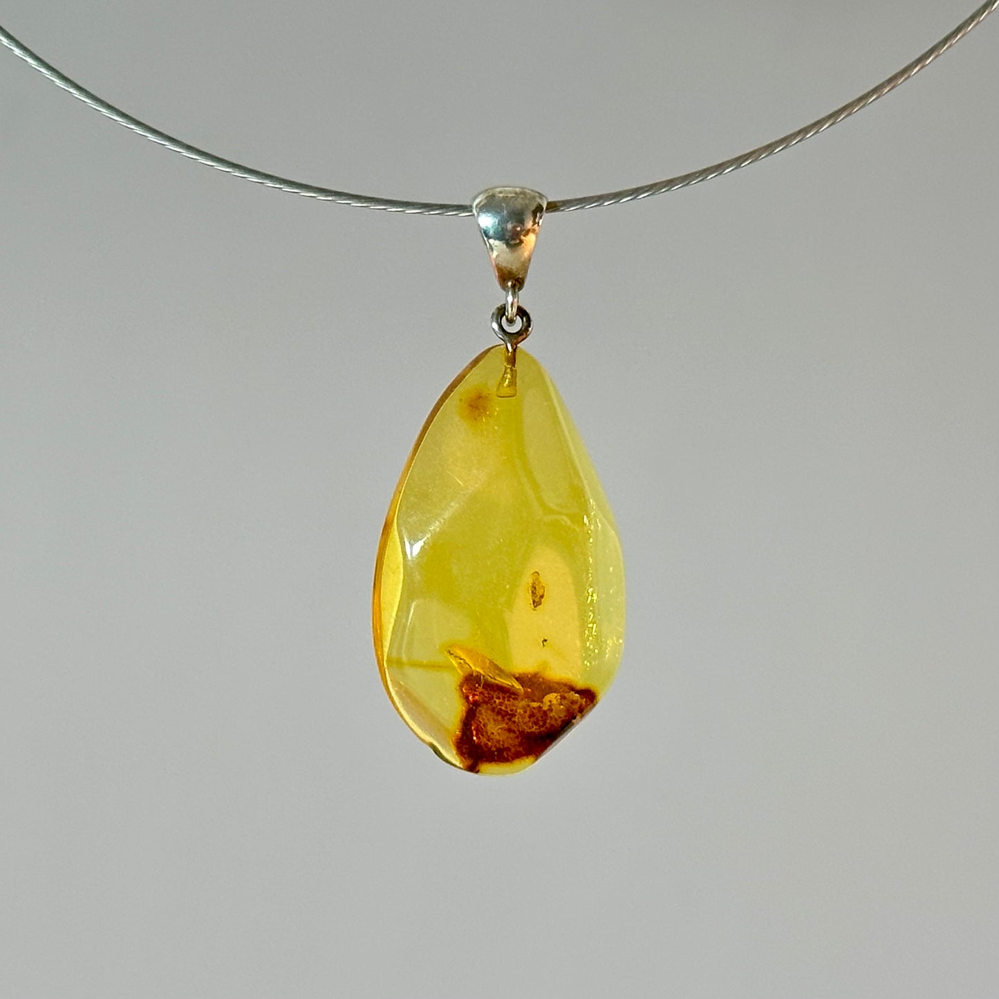 Radiant drop amber pendant