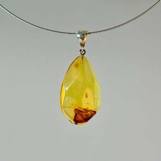 Radiant drop amber pendant