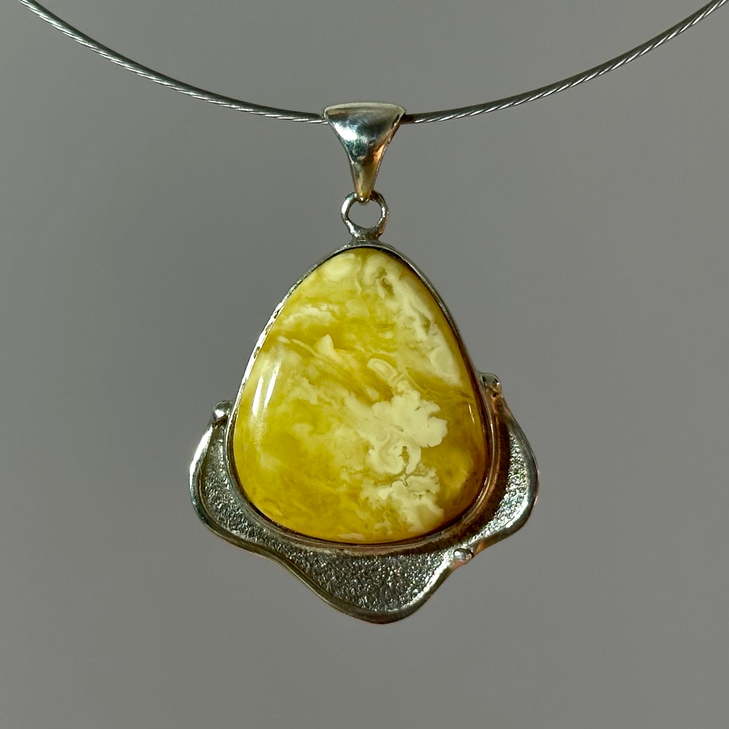 Stunning white amber pendant