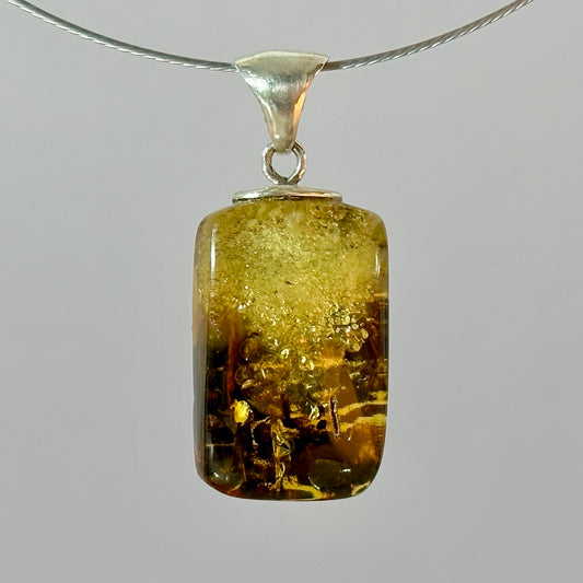 Sea-inspired green amber pendant