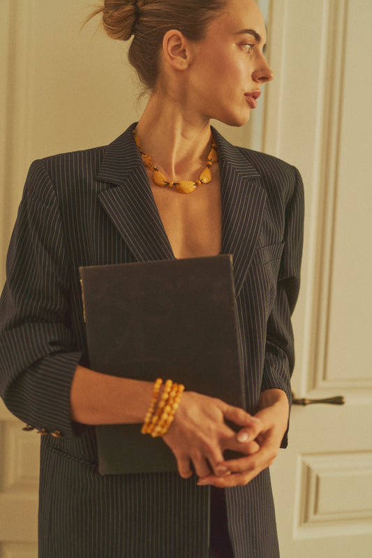 Playful amber cord necklace